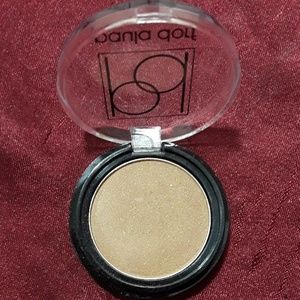 I am selling a bronzer, & 2 eye shadows and a bag